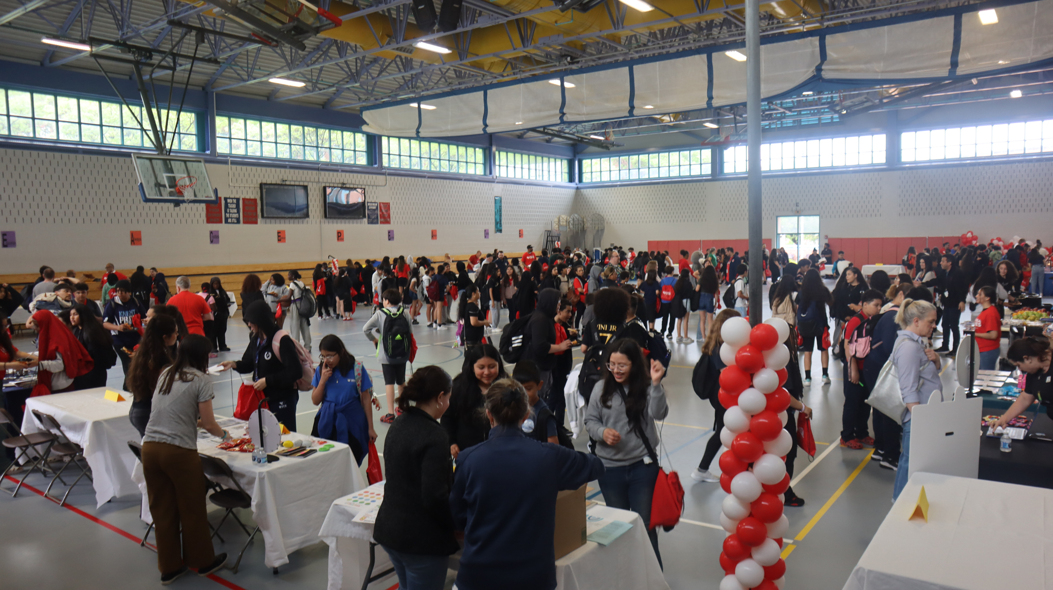 A picture of the Williams School gymnasium filled with students at the 2024 Youth Mental Health & Wellness Day